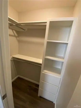 a storage room with washer and dryer