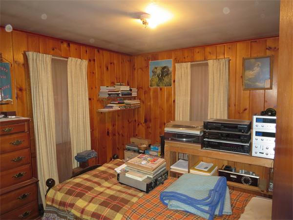 1656 Mammoth Road Dracut, MA 01826 - Photo 5 of 7 a bedroom with a bed and a dresser