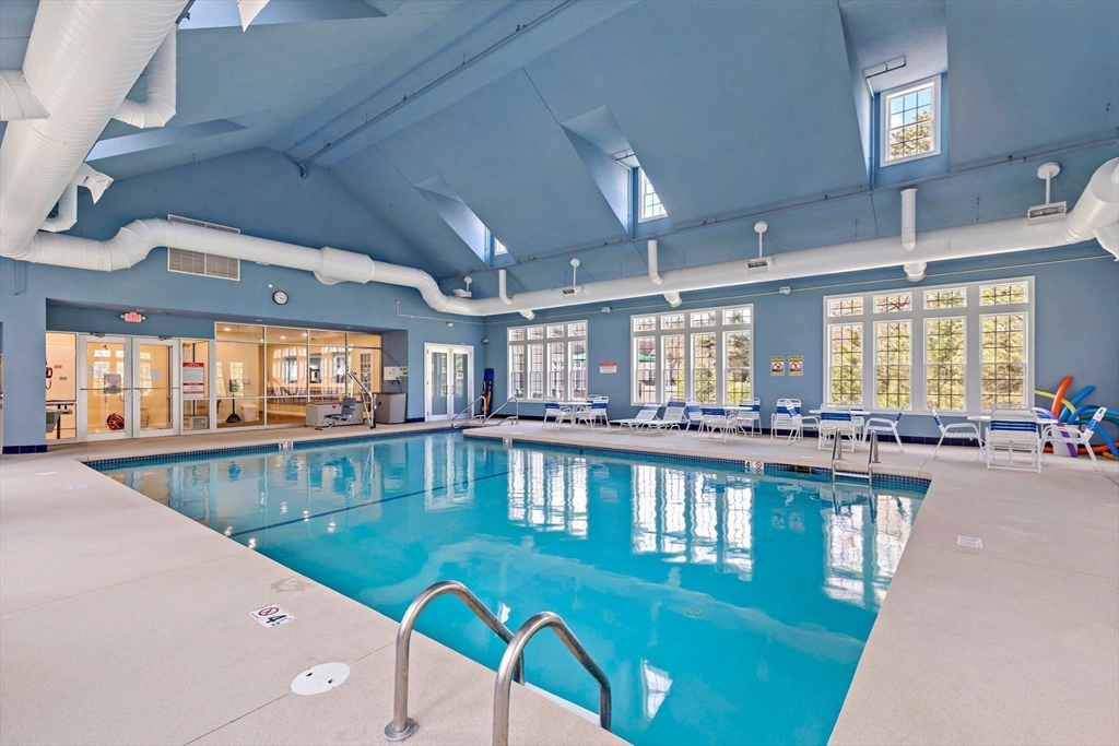 31 Fox Hollow Plymouth, MA 02360 - Photo 36 of 39 a large white kitchen with lots of counter space
