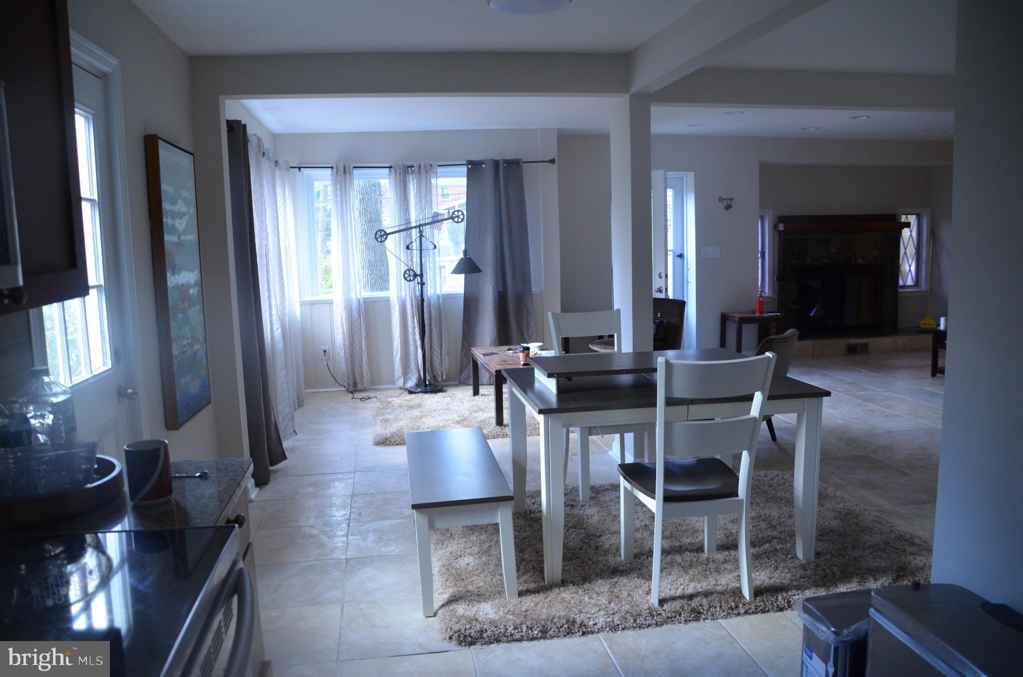 8709 Reading Road Silver Spring, MD 20901 - Photo 17 of 44 a view of a dining room with furniture