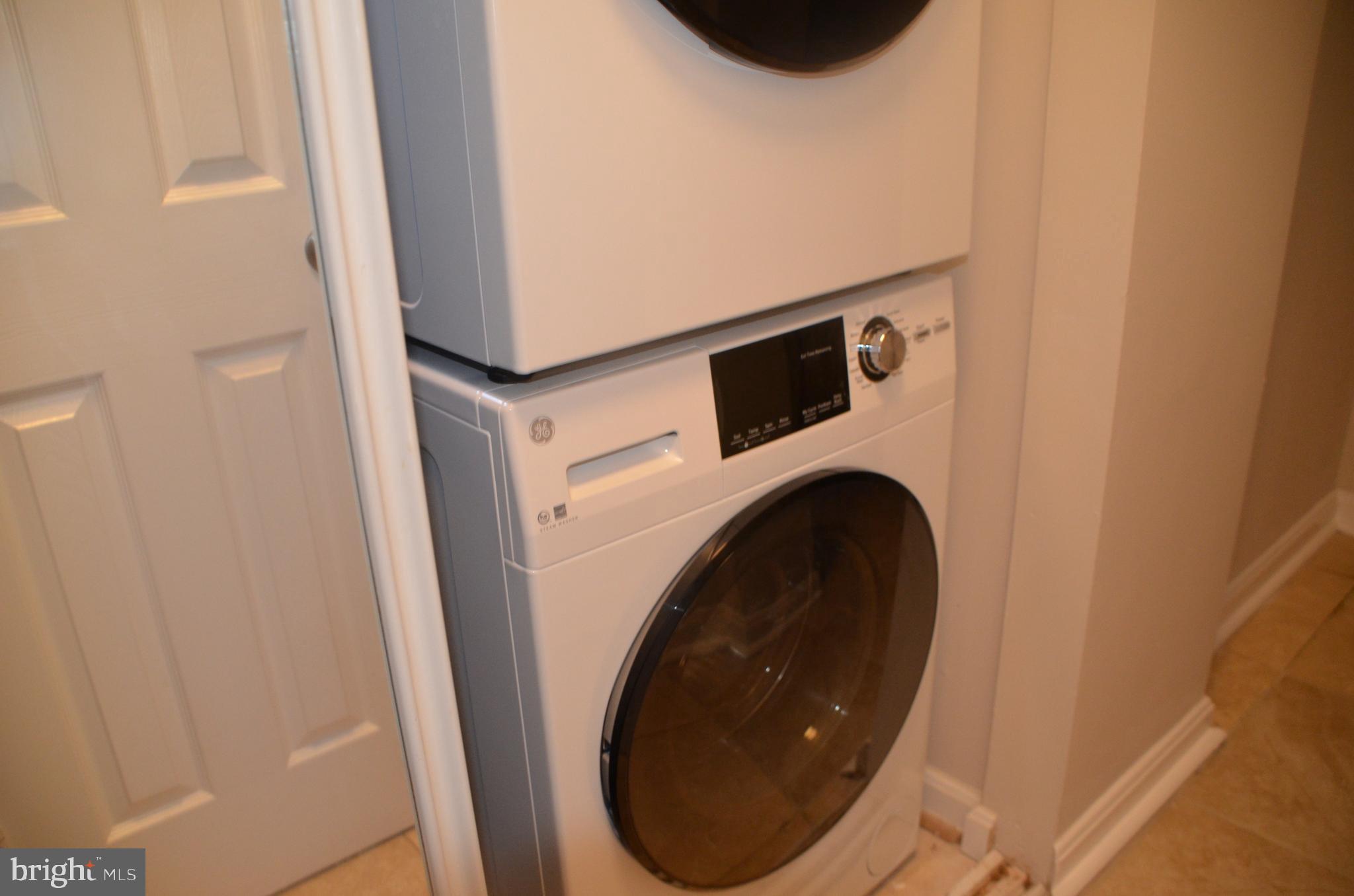 8709 Reading Road Silver Spring, MD 20901 - Photo 22 of 44 a close up view of a washer and dryer