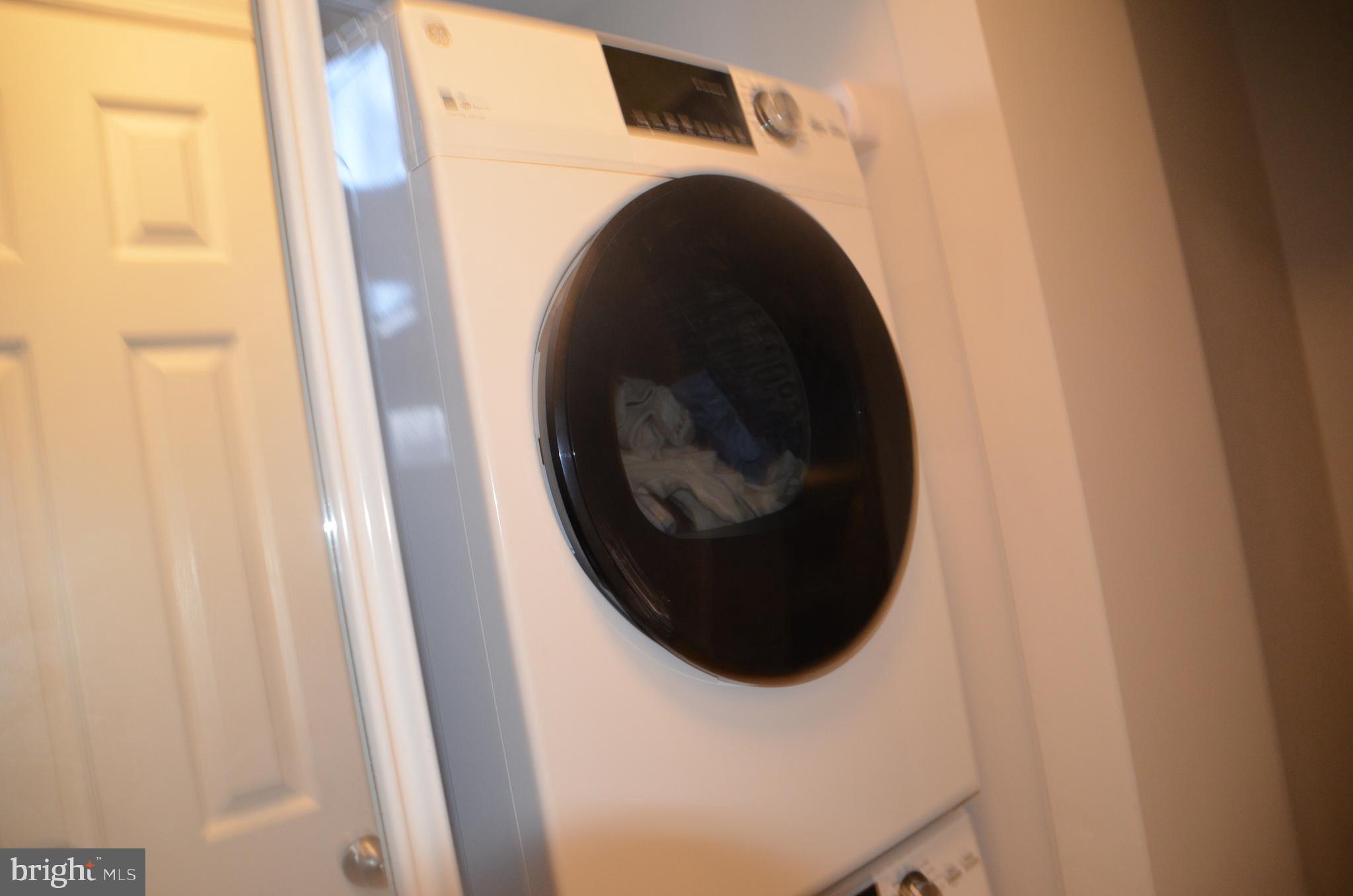 8709 Reading Road Silver Spring, MD 20901 - Photo 23 of 44 a close up view of a washer and dryer