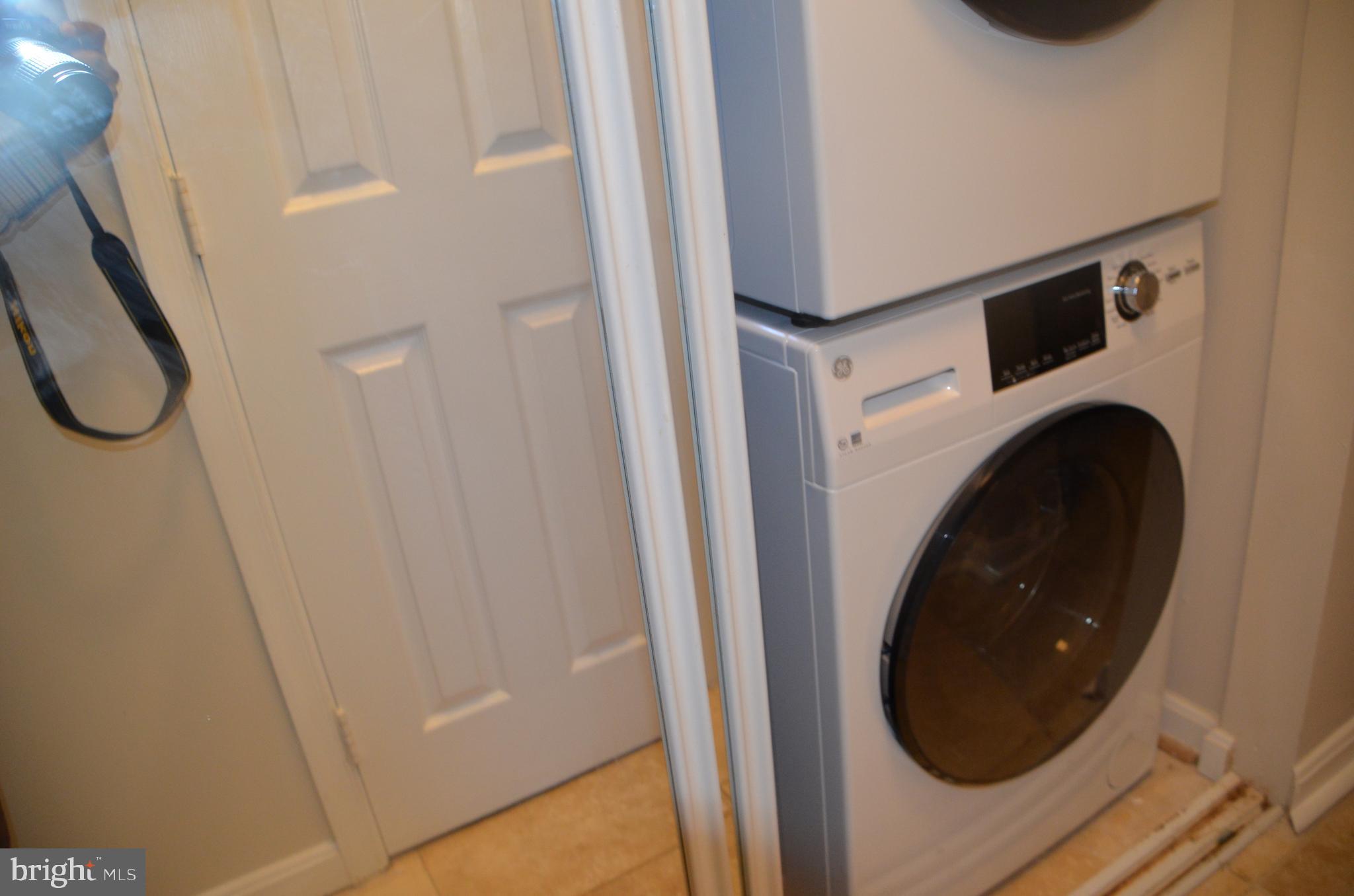 8709 Reading Road Silver Spring, MD 20901 - Photo 33 of 44 a close up view of a washer and dryer