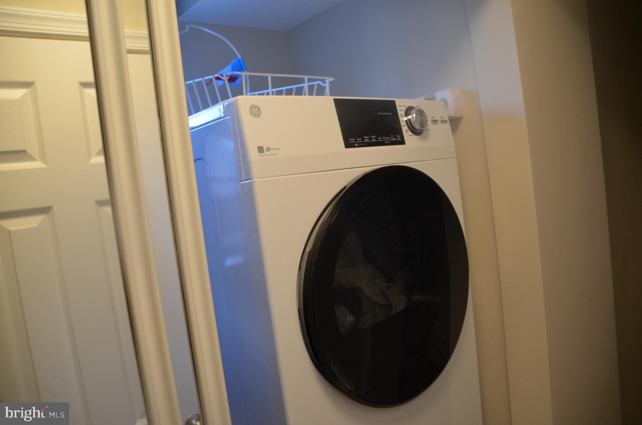 8709 Reading Road Silver Spring, MD 20901 - Photo 34 of 44 a close up view of a washer and dryer