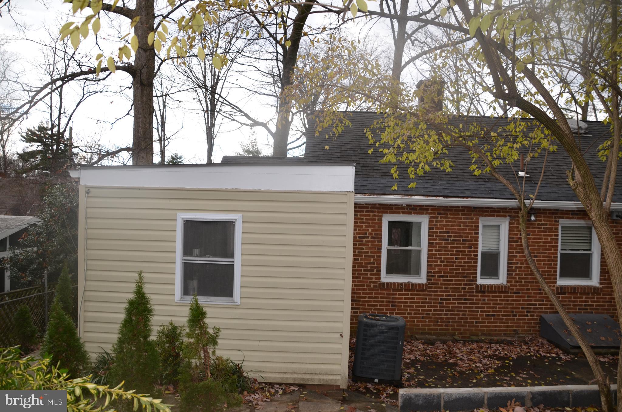 8709 Reading Road Silver Spring, MD 20901 - Photo 39 of 44 a view of a house with a yard