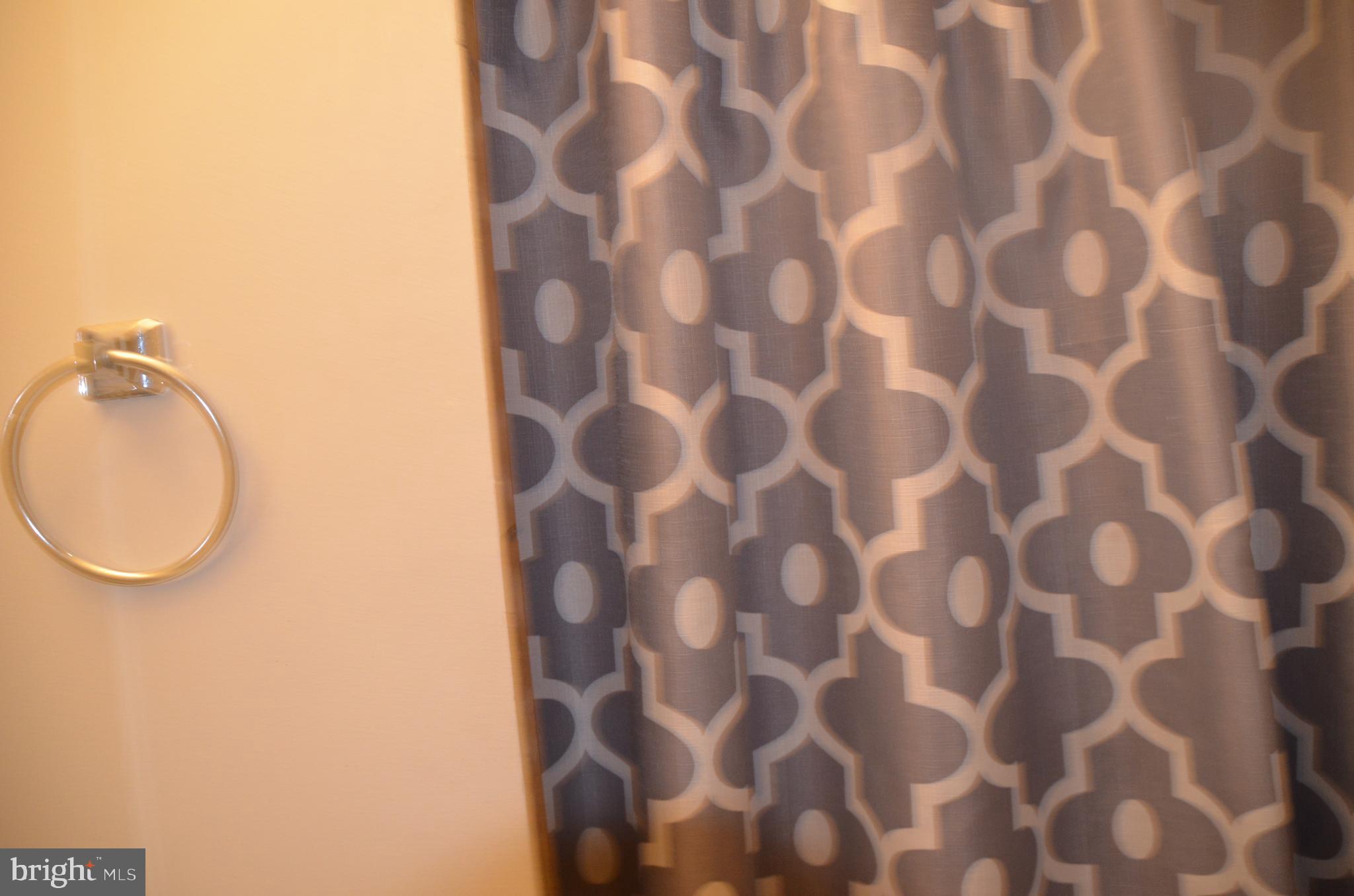 8709 Reading Road Silver Spring, MD 20901 - Photo 10 of 44 a bathroom with a sink and a mirror