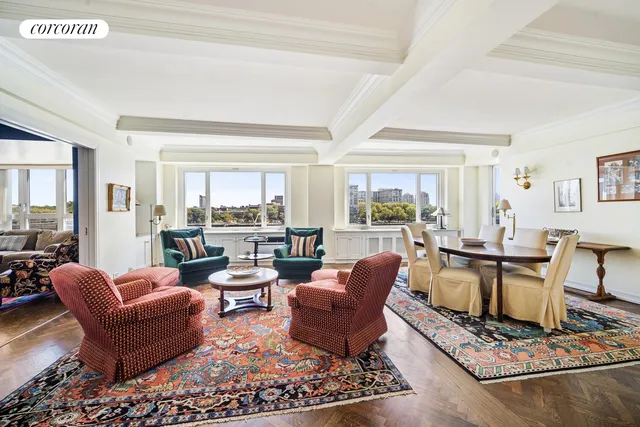 a living room with furniture and a rug