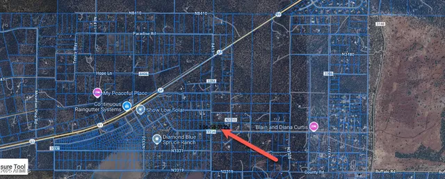 a room with water heater and wooden walls