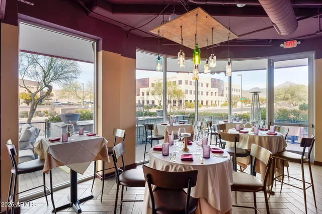 an aerial view of a kitchen with an oven and a mirror