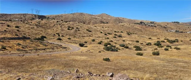 a view of mountains covered with snow