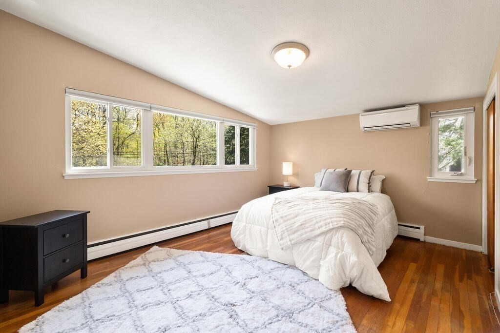 2 Peacock Farm Road Lexington, MA 02421 - Photo 15 of 30 a bedroom with a bed and a window