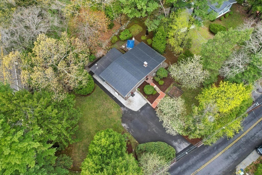 2 Peacock Farm Road Lexington, MA 02421 - Photo 28 of 30 a view of house with a yard