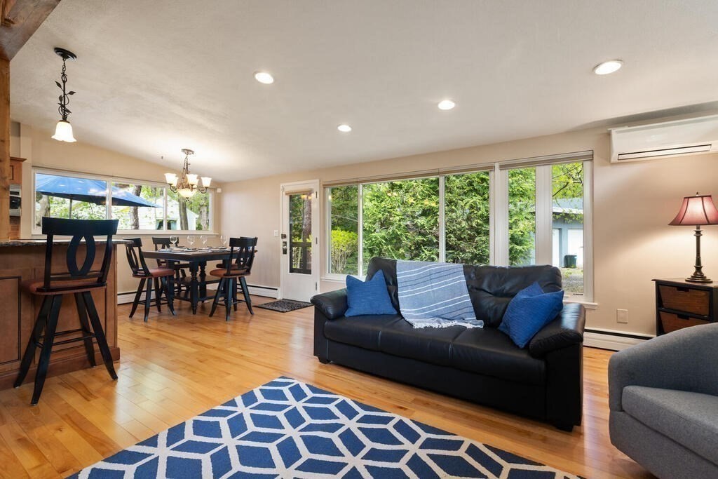 2 Peacock Farm Road Lexington, MA 02421 - Photo 5 of 30 a living room with furniture and a large window