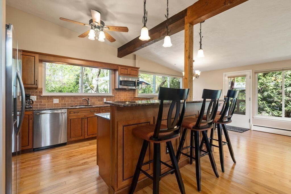 2 Peacock Farm Road Lexington, MA 02421 - Photo 9 of 30 a view of a dining room with furniture window and wooden floor