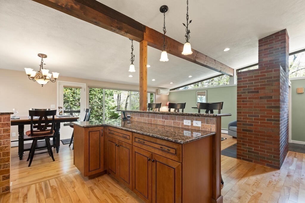2 Peacock Farm Road Lexington, MA 02421 - Photo 10 of 30 a kitchen with stainless steel appliances granite countertop a stove and a wooden floors