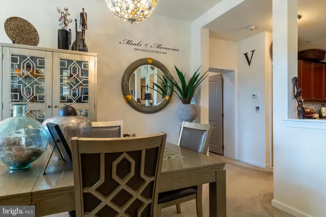 a view of a closet area with living room