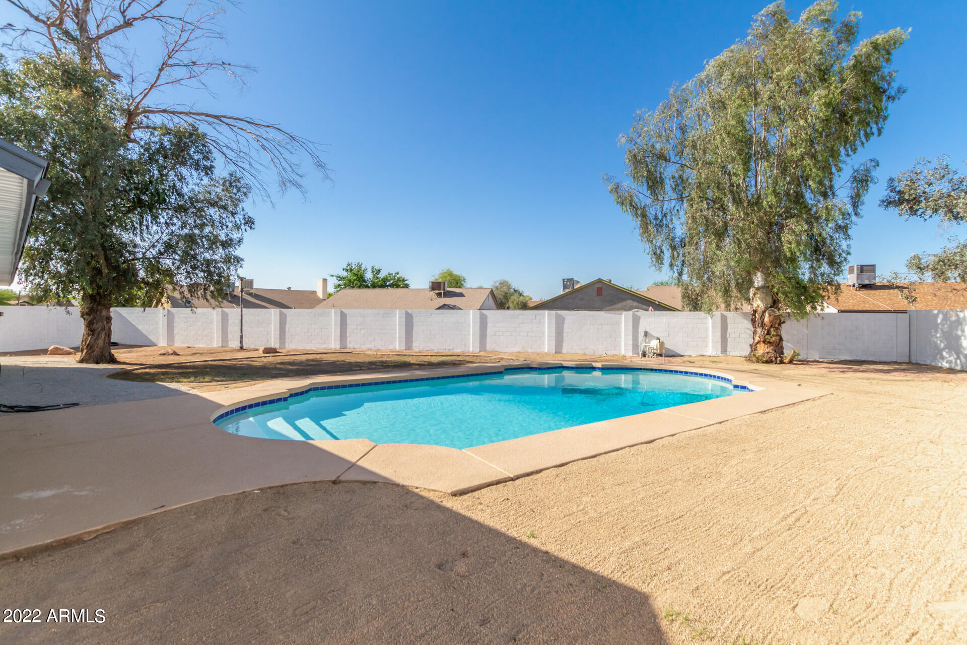 4110 East Vineyard Road Phoenix, AZ 85042 - Photo 30 of 31 a view of an outdoor space and swimming pool
