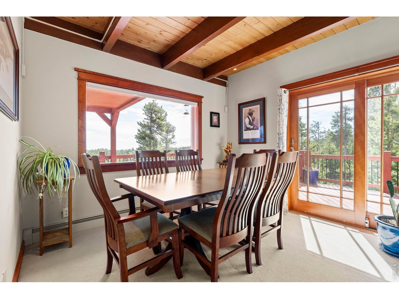 1109 Indian Peak Road Golden, CO 80403 - Photo 15 of 50 Second dining area to walkout wraparound deck