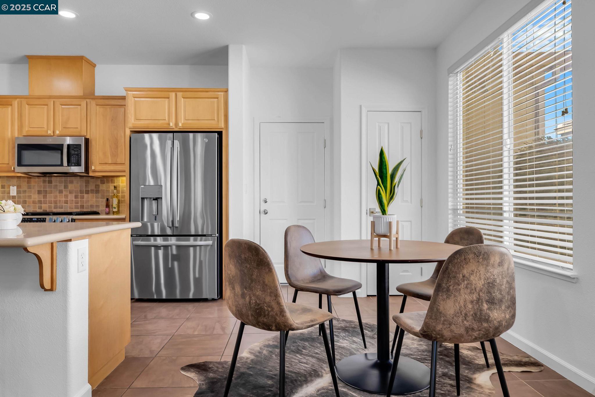 900 Brookside Lane Rio Vista, CA 94571 - Photo 22 of 60 a view of a dining room with furniture window and wooden floor