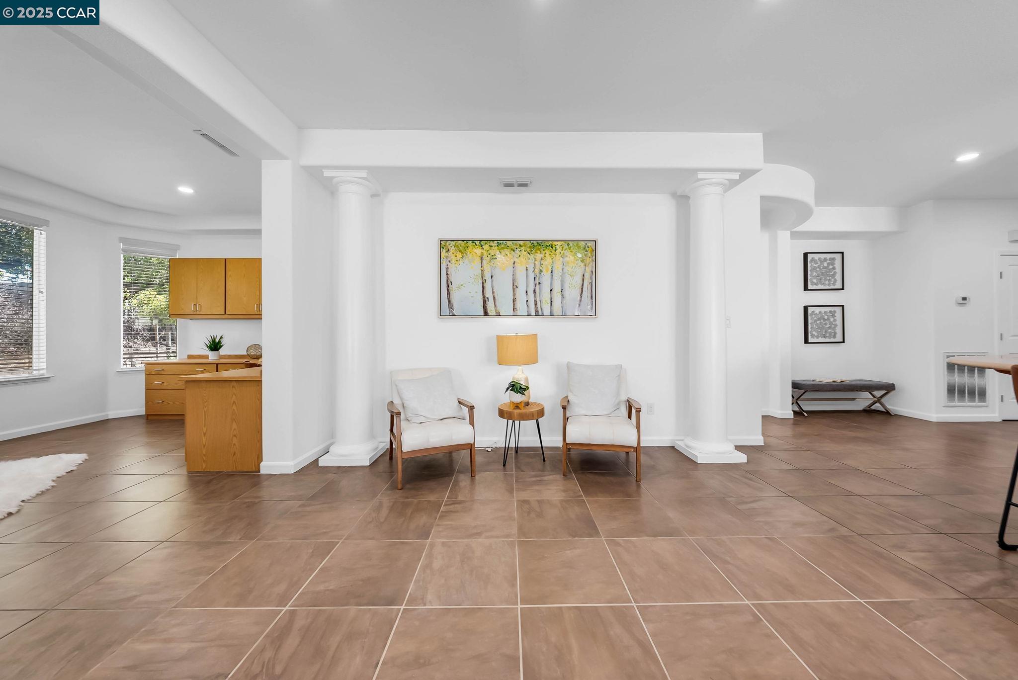 900 Brookside Lane Rio Vista, CA 94571 - Photo 24 of 60 a living room with couches and a view of kitchen appliance