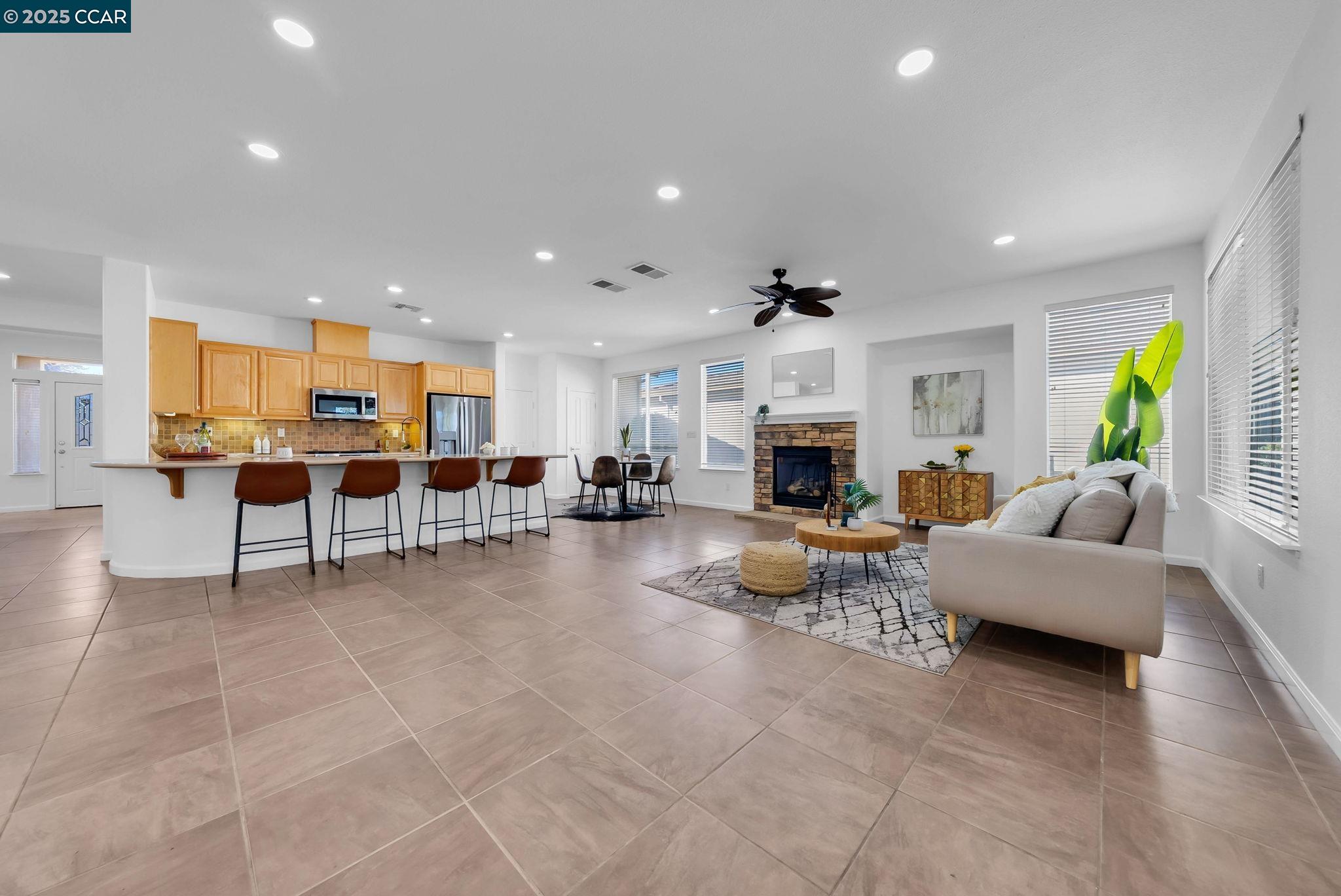900 Brookside Lane Rio Vista, CA 94571 - Photo 25 of 60 a living room with furniture and a fireplace