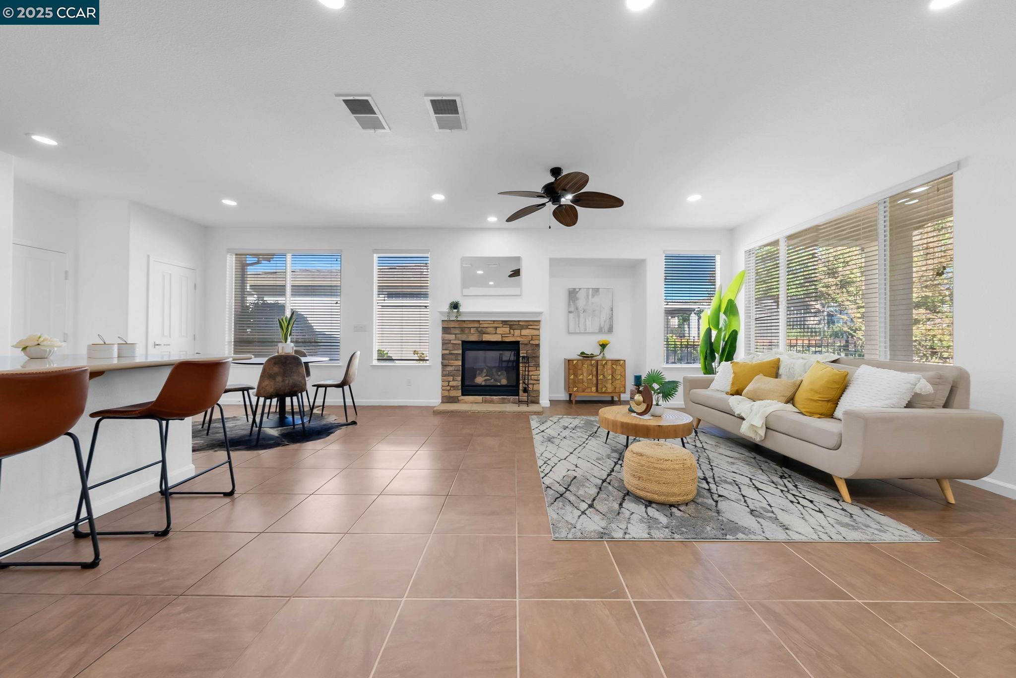 900 Brookside Lane Rio Vista, CA 94571 - Photo 26 of 60 a living room with furniture and a fireplace
