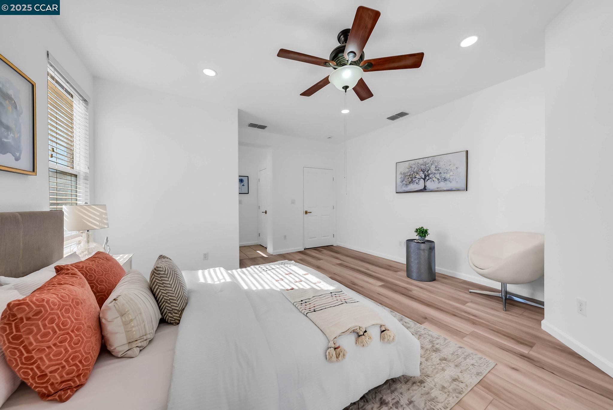 900 Brookside Lane Rio Vista, CA 94571 - Photo 37 of 60 a bedroom with a bed and ceiling fan