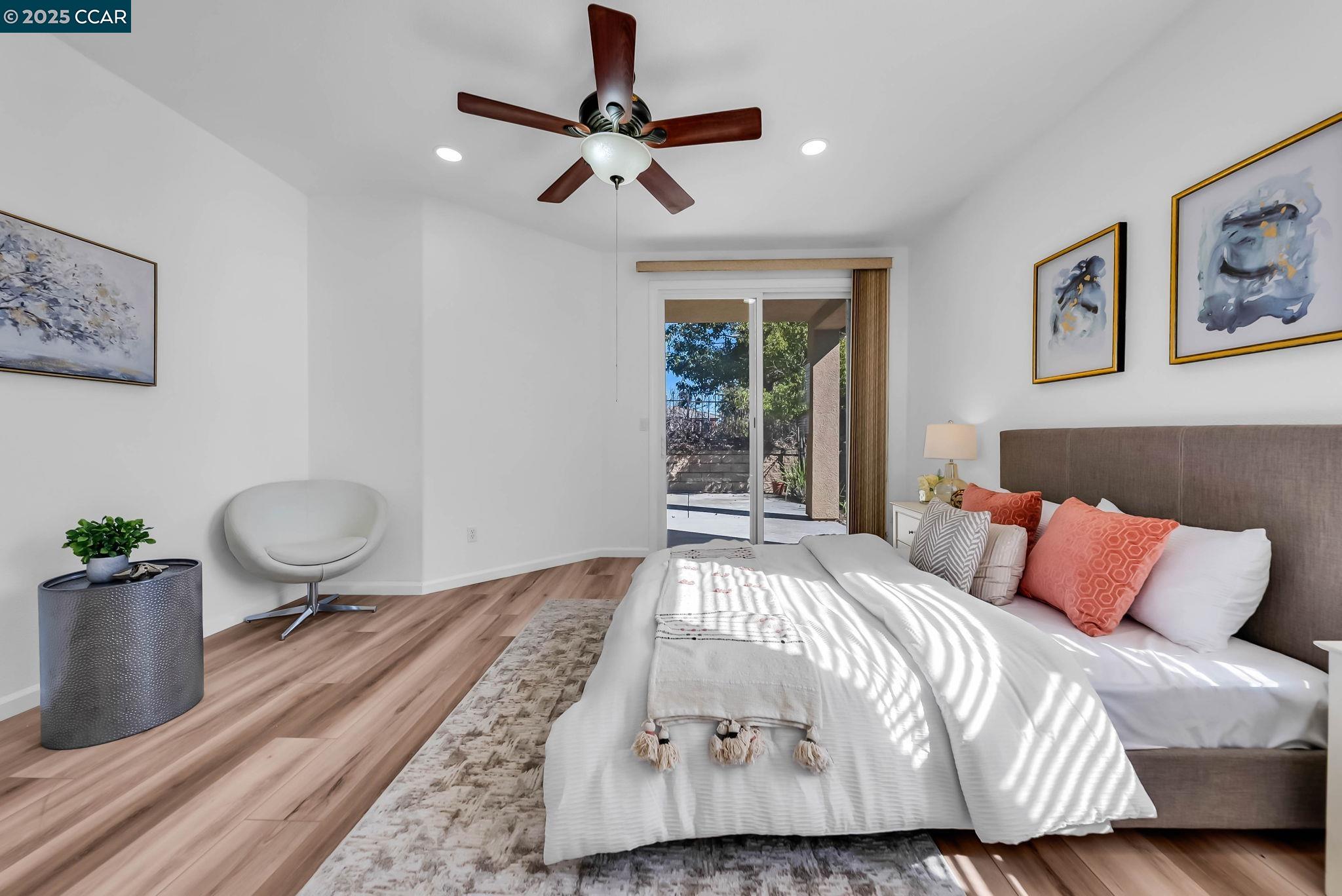 900 Brookside Lane Rio Vista, CA 94571 - Photo 38 of 60 a bedroom with a bed and painting on the wall