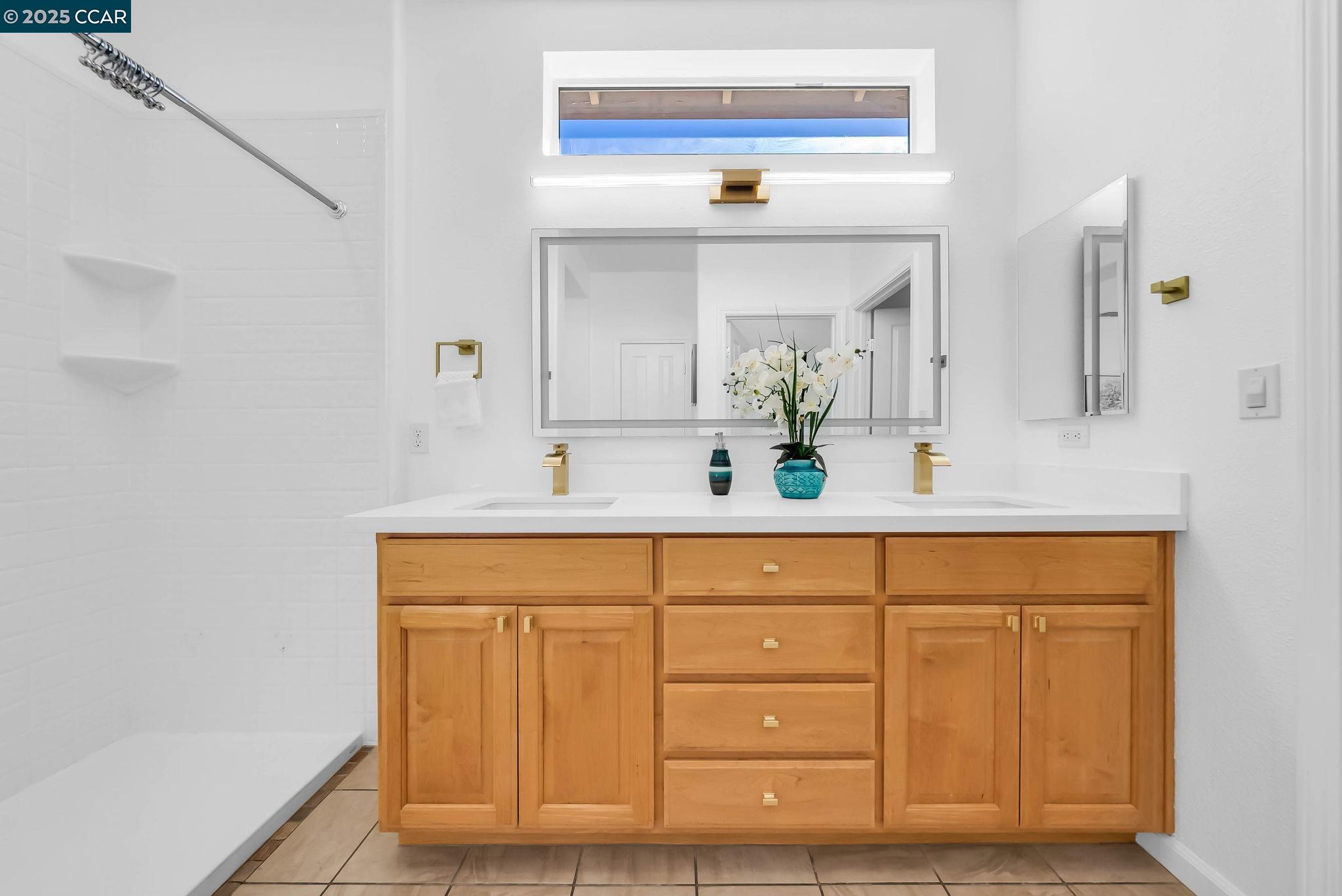 900 Brookside Lane Rio Vista, CA 94571 - Photo 40 of 60 a bathroom with a sink and a mirror