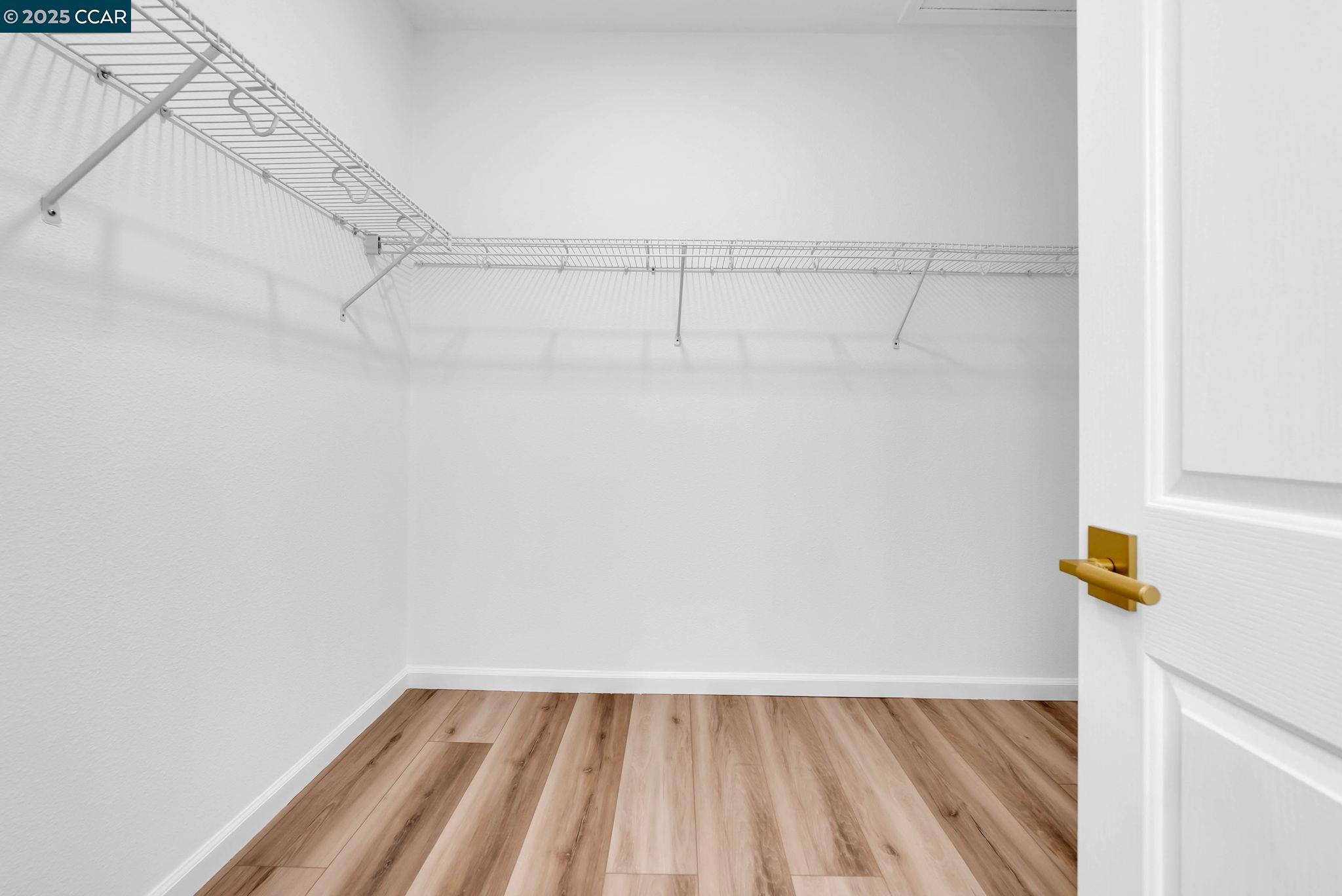 900 Brookside Lane Rio Vista, CA 94571 - Photo 43 of 60 a view of walk in closet with empty racks