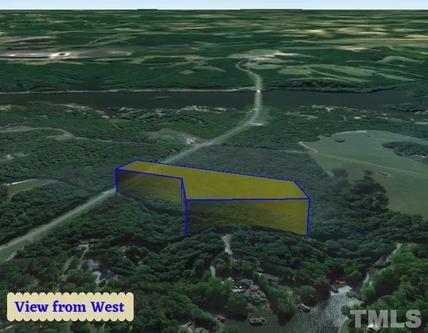 a view of a golf course with a lake