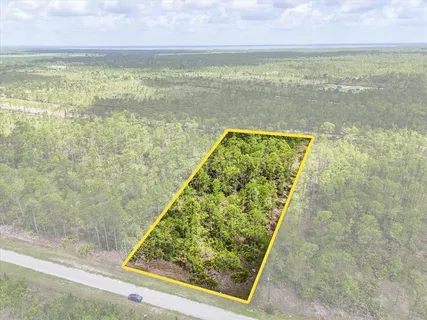 a view of a swimming pool and an outdoor space