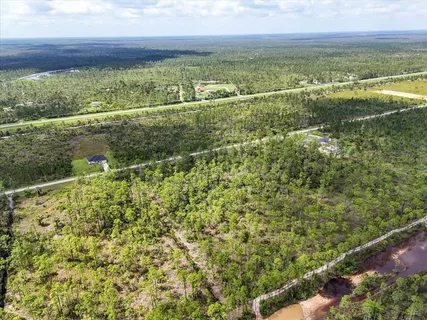 a view of a lake with a city