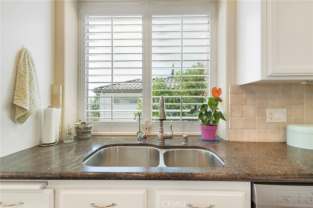3294 Summit Ridge Terrace Chico, CA 95928 - Photo 20 of 68 a kitchen sink with a granite countertop window and sink