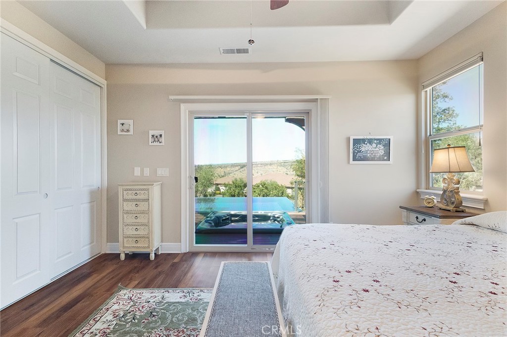 3294 Summit Ridge Terrace Chico, CA 95928 - Photo 26 of 68 a bedroom with a bed and large window