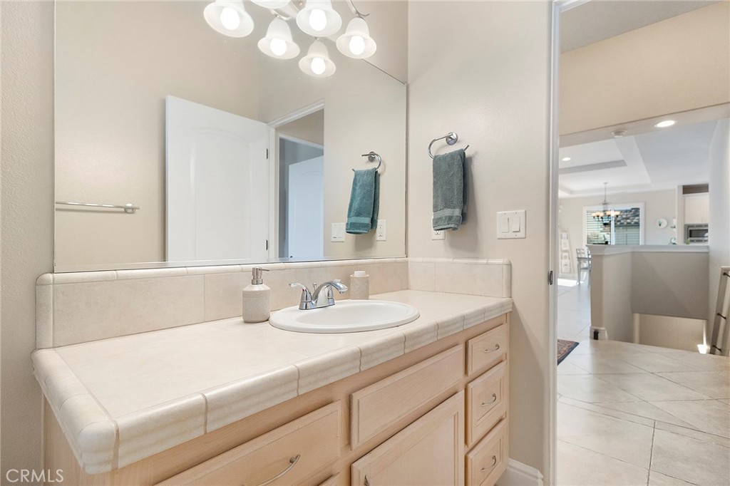 3294 Summit Ridge Terrace Chico, CA 95928 - Photo 35 of 68 a bathroom with a sink and a mirror