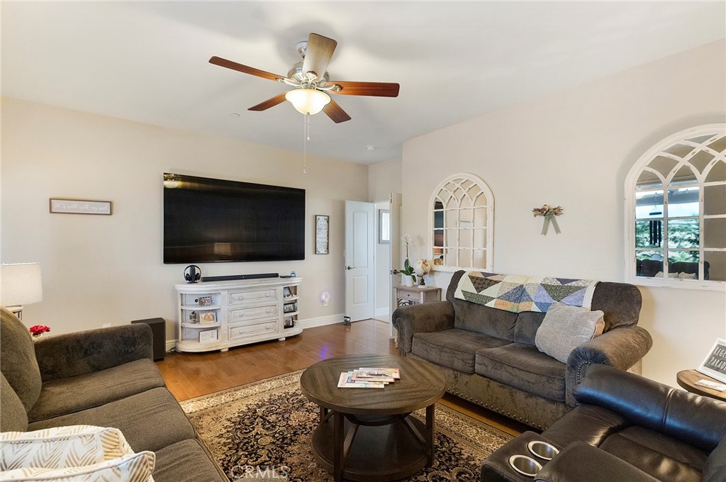 3294 Summit Ridge Terrace Chico, CA 95928 - Photo 42 of 68 a living room with furniture and a flat screen tv