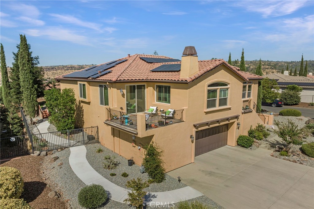 3294 Summit Ridge Terrace Chico, CA 95928 - Photo 60 of 68 a front view of a house with a yard