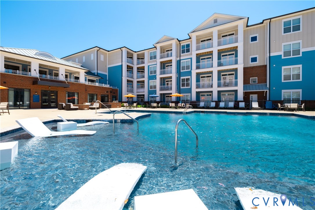 10525 Stony Blf Drive, Unit 202 Ashland, VA 23005 - Photo 8 of 30 Community pool with a patio area