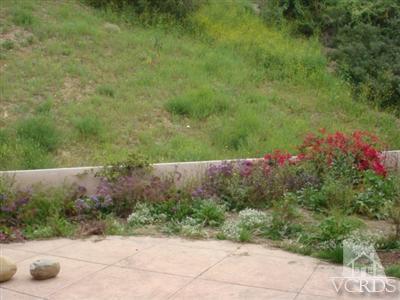 520 Marissa Lane Camarillo, CA 93010 - Photo 12 of 16 a view of a yard with potted plants