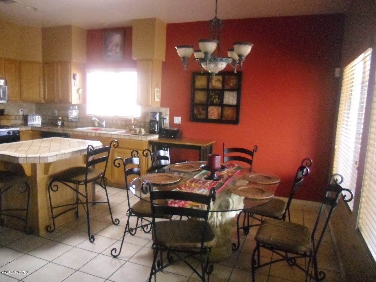 39 Camino Pesqueira Rio Rico, AZ 85648 - Photo 15 of 29 a view of a dining room with furniture and chandelier