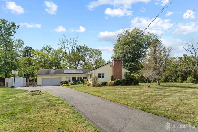 a house view with a garden space