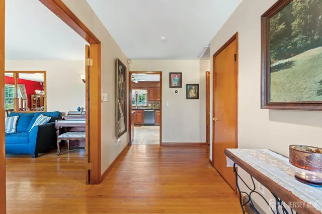 a view of a livingroom with furniture and windows