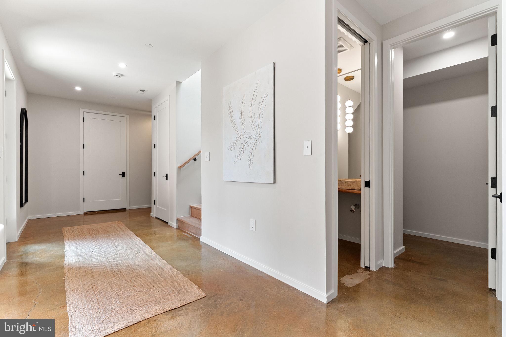 21 Overbeck Alley Northeast Washington, DC 20002 - Photo 22 of 63 a view of a hallway with closet