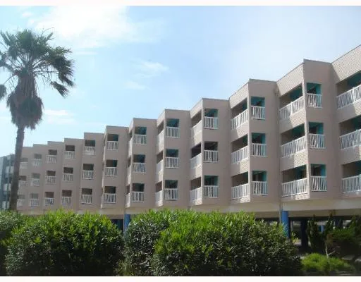 a view of a building with a garden
