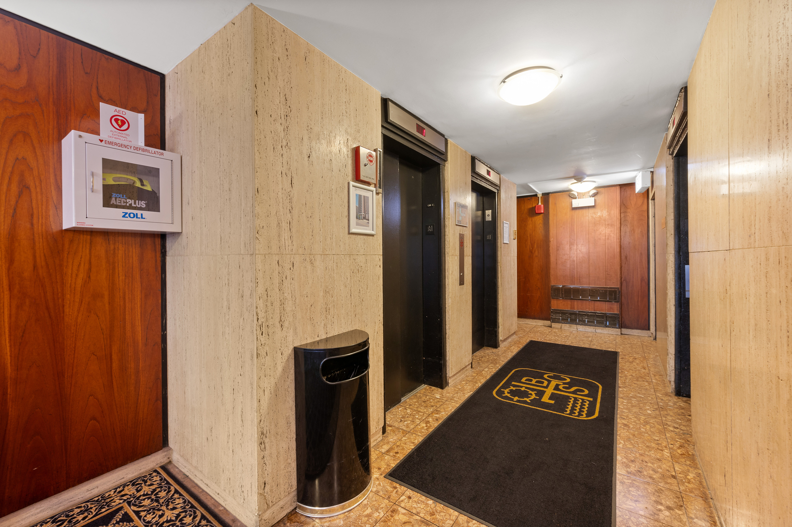 5855 North Sheridan Road, Unit 10G Chicago, IL 60660 - Photo 28 of 31 a view of a hallway with washer and dryer