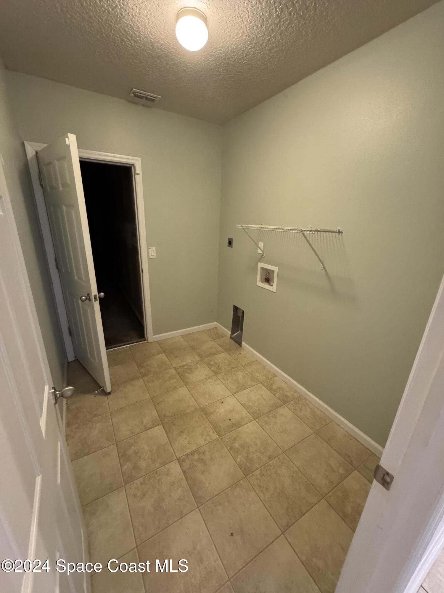 5281 Talbot Boulevard Cocoa, FL 32926 - Photo 12 of 31 a view of a room with an empty space