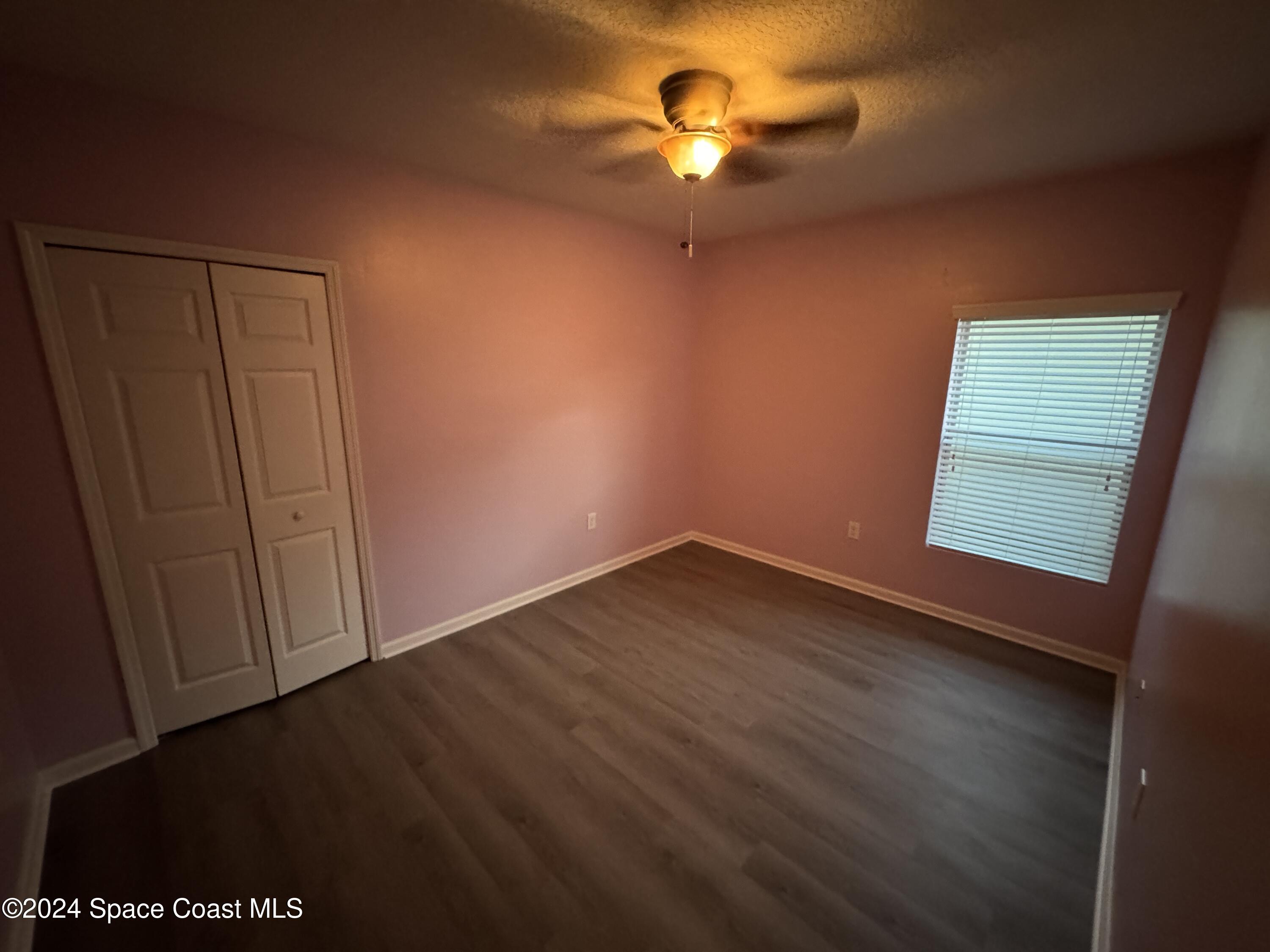 5281 Talbot Boulevard Cocoa, FL 32926 - Photo 22 of 31 an empty room with a window