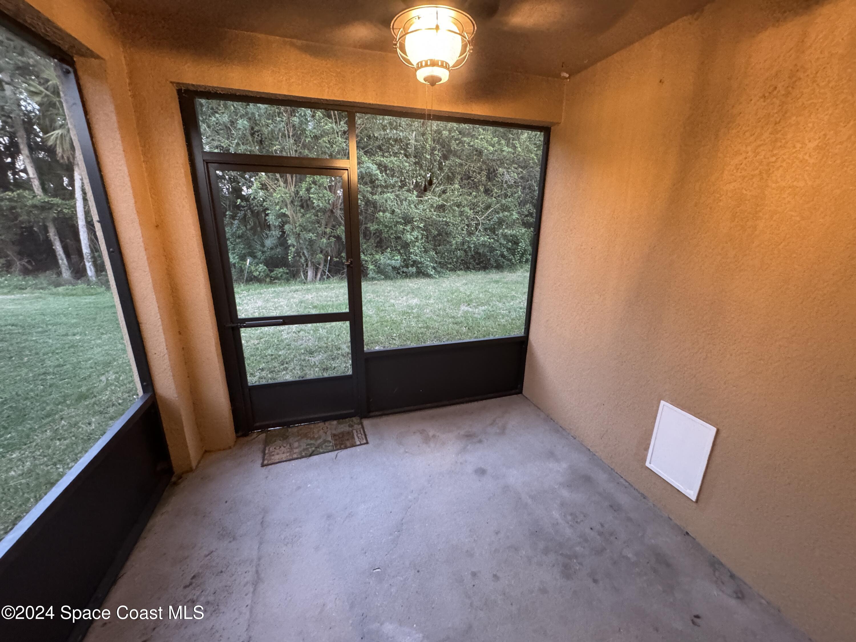 5281 Talbot Boulevard Cocoa, FL 32926 - Photo 27 of 31 a view of an empty room with a window
