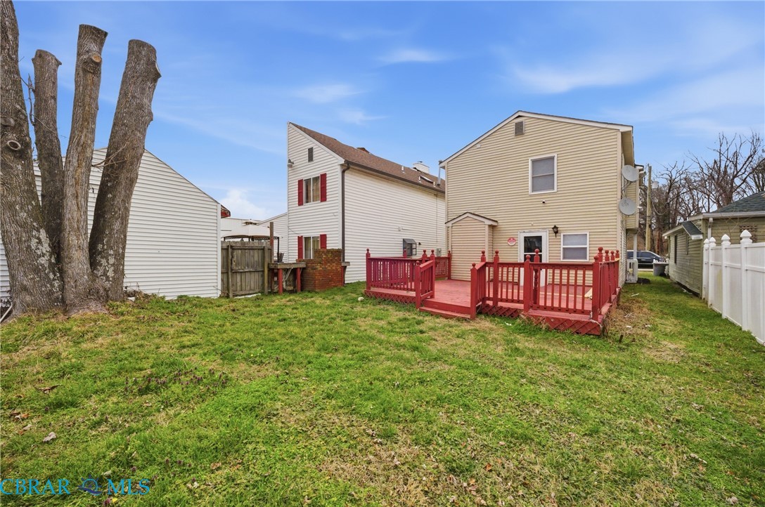 733 Spruce Street Hampton, VA 23661 - Photo 27 of 29 Back of house with a deck, a fenced backyard, and a gate